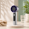 BreezFlow Mini black handheld portable fan with battery display